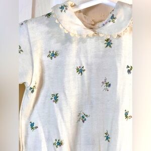 Honore baby onesie in a French Size 1–A perfect luxury baby shower gift